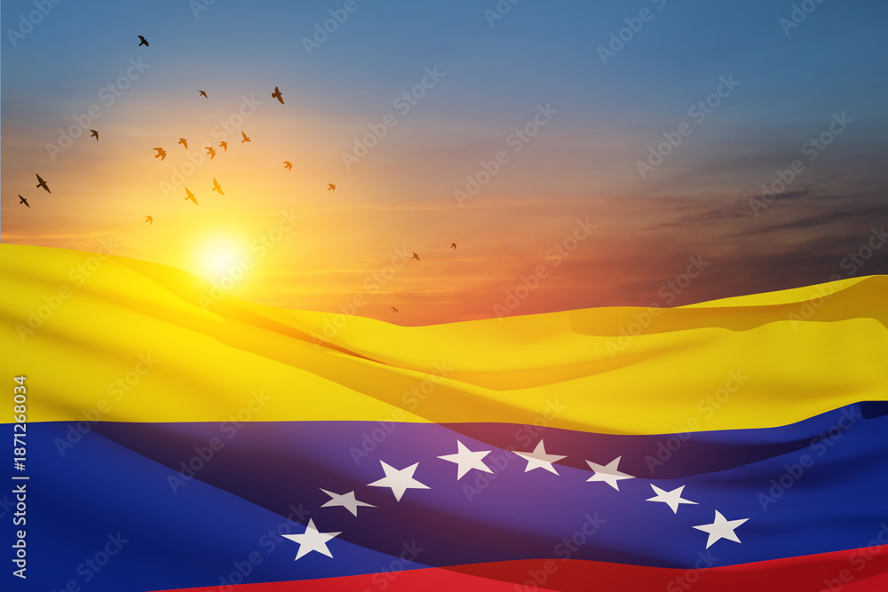 Naklejka premium Venezuela flag on background of sunset sky with flying birds. Patriotic concept. Banner with place for text.