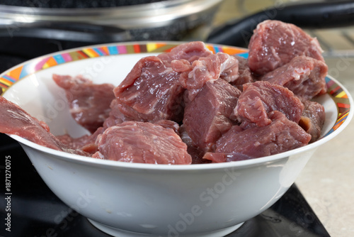Canvas-taulu Meat cut into pieces for lunch. Chunks of raw lard on a plate.