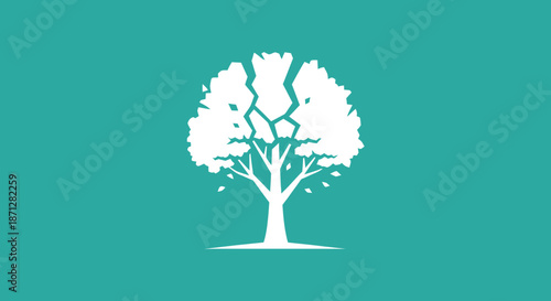 Silhouette of a tree against a green backdrop