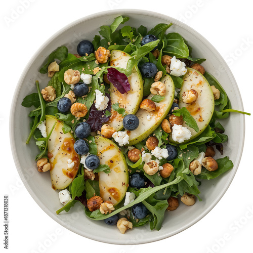 Fresh Salad With Greens, Fruits, Nuts, and Cheese Served in Bowl