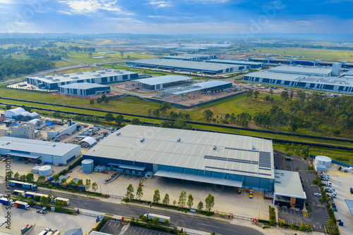 Drone aerial photograph of buildings in the large and growing industrial precinct of Kemps Creek in Western Sydney in New South Wales, Australia.