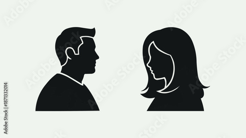 Silhouette profiles of a man and a woman facing each other.