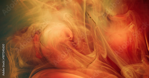 Atmospheric smoke. Shiny particles. Blur orange pink blue color cloud broken glass glitter ink splash on abstract underwater background. © golubovy