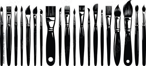 Collection of black paint brushes various sizes and shapes for art and design isolated isolated on white background