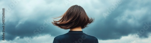 Woman Facing Stormy Sky, Back View - Hair Blowing in Wind, weather ,freedom