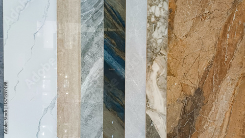 Collection of marble and granite tile samples. Vertical luxury stone textures in white, grey, and brown. Ideal for interior design, flooring, and home renovation concepts.