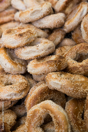 bunch of freshly made sesame seeds bagels