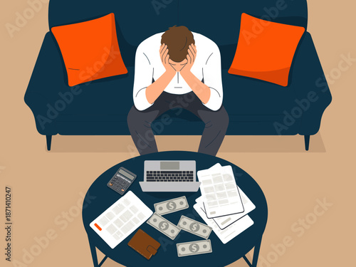 Stressed businessman sitting on couch with head in hands facing financial difficulties and business challenges in modern office workspace with laptop documents and money for corporate presentation tec