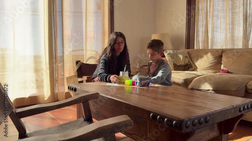 Mother and Son Having Breakfast Summer Vacation Home Uruguay
