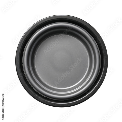 Dark Circular Container Placed on a Flat Surface in a Well-Lit Area During th...