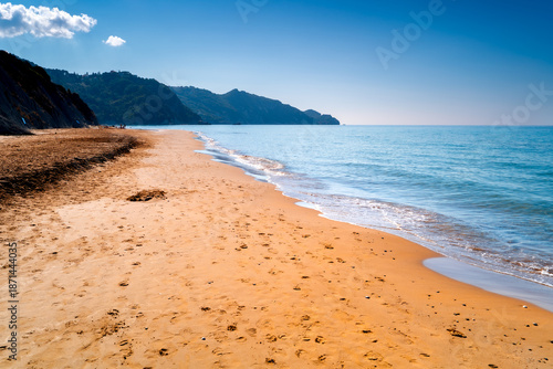 Photos Wide golden-sand Arillas Beach on coast Corfu