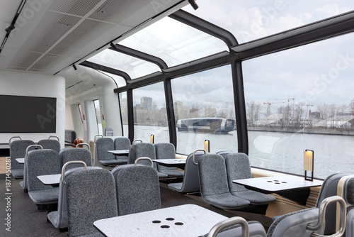 Empty modern passenger ferry interior, public transport and urban mobility concept