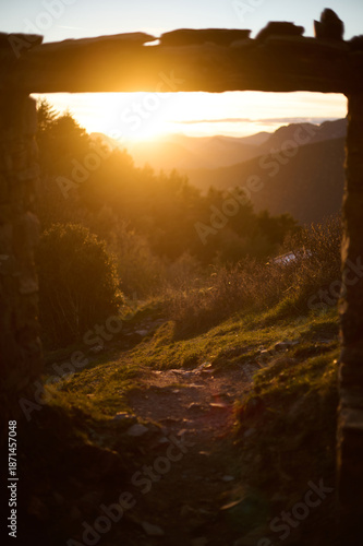 Wallpaper Mural Golden hour sunset views over autumn forests and mountains along the Hermitages route in Tella Pyrenees Spain Torontodigital.ca