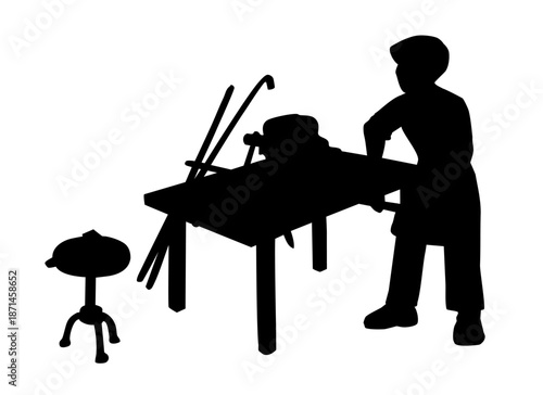 Vector drawing. A boy works with metal in a workshop
