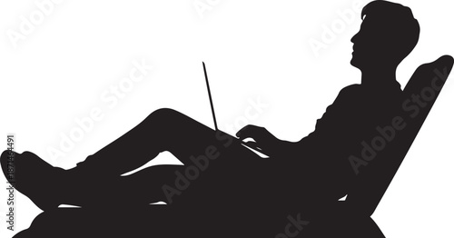 Silhouette of a man reclining in a chair with a laptop