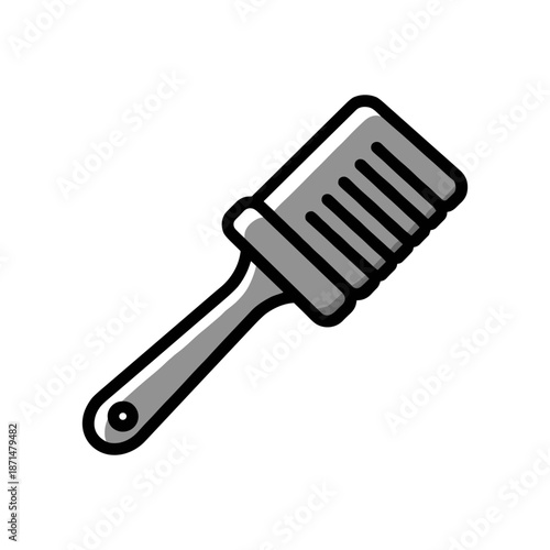 A sleek, modern kitchen spatula resting on a clean countertop with bright natural light