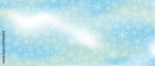 Winter background with white snowflakes on light blue gradient, banner format