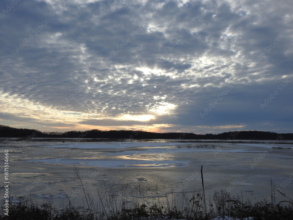 Fototapeta premium The tranquil beauty of the wetlands, during the winter season. Bombay Hook National Wildlife Refuge, Kent County, Delaware. 