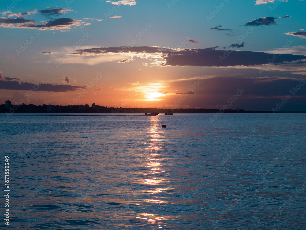 Obraz premium sunset over the river
