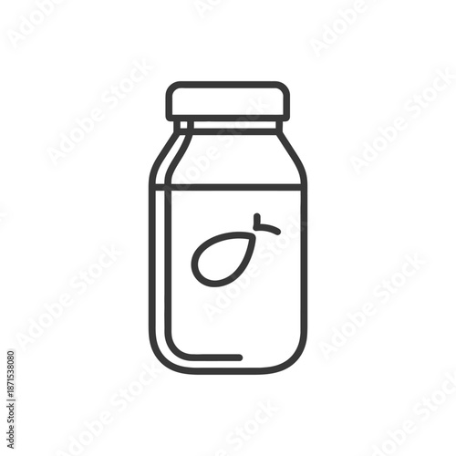 A Glass Jar Contains A Single Almond Inside