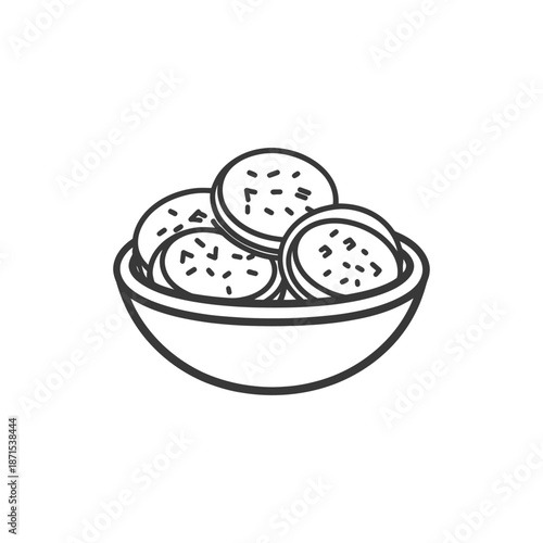 A bowl of cookies sits ready to be eaten