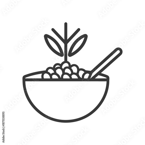 A bowl of cereal with a plant garnish and spoon