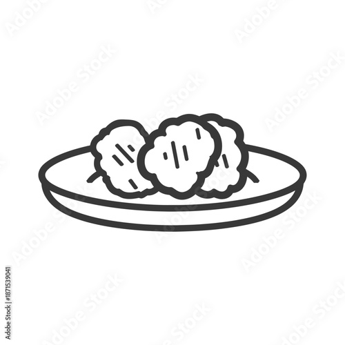 Three Chicken Nuggets Served On A Plate