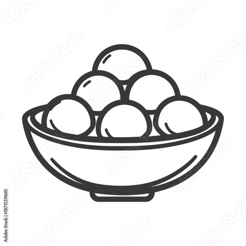 A bowl of round sweet treats sits ready to be enjoyed