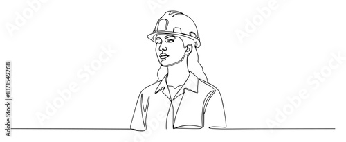 female builder wearing hard hat and uniform drawing