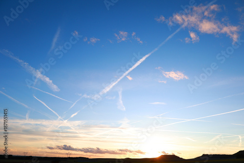 Mysterious Contrails Over Sunset Sky, Climate Engineering Theory Concept