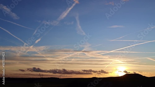 Unusual Aircraft Trails at Sunset, Geoengineering Debate Concept