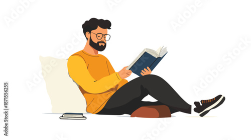 Man Reading Book Sitting on Floor.