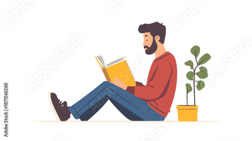 Man Reading Book Sitting on Floor.
