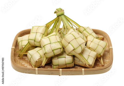 ketupat rice cakes in woven palm leaf pouch on a basket
