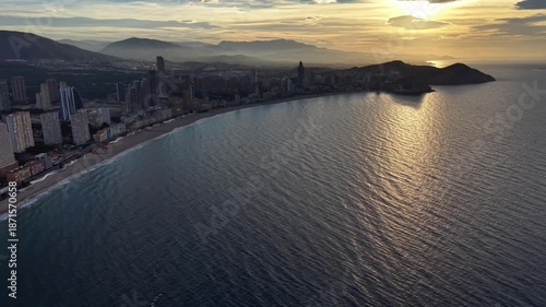 Wallpaper Mural Sunset Reflection On Rippled Ocean Water Near Coastal Skyline, Golden Path Across Waves, Silhouetted Torontodigital.ca