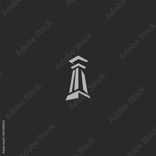 Geometric abstract stone pillar logo symbolizing stability, strength, and legacy.