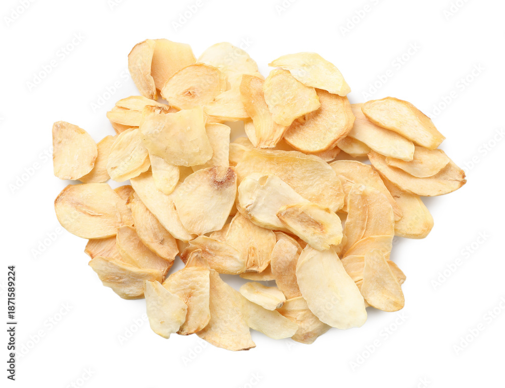 Fototapeta premium Pile of dried garlic flakes isolated on white, top view