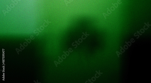 green background with shadowy figure