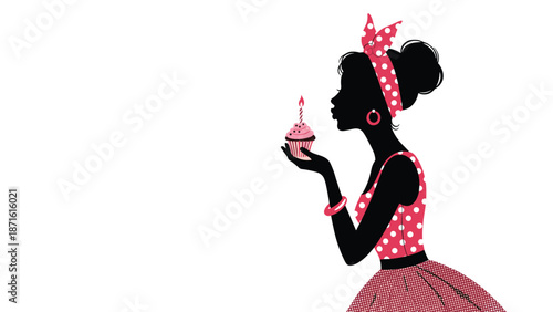 Silhouette of a woman in retro polka-dot attire holding a cupcake with one candle, making a wish on her birthday or during a special celebration.