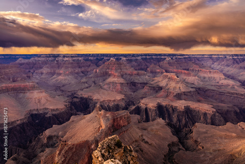Golden Sunset Light Hitting Grand Canyon Peaks Over Deep Shadows