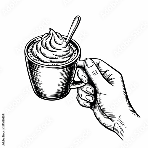 Hand holding a cup of coffee or hot chocolate with whipped cream