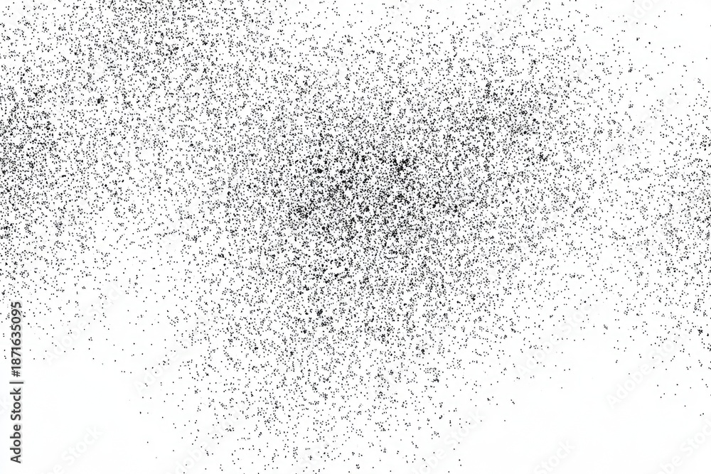 Obraz premium Black dots densely scattered on white, forming a grainy, textured pattern