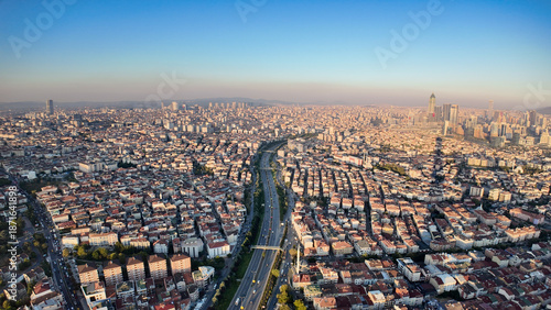 Aerial view of a istanbul city with many houses and a busy road during the day. © Towfiqu Barbhuiya 