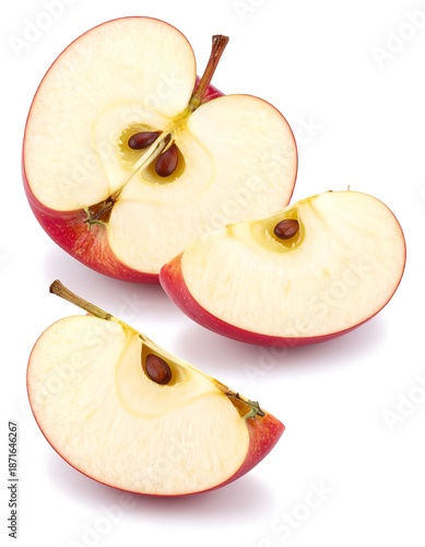 Red apple slices on white