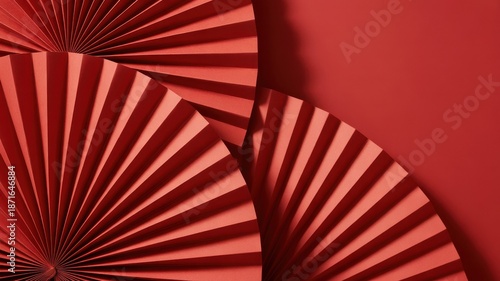 Red paper fan decorations on a red background