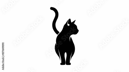 Silhouette of a black cat standing and looking to the side.