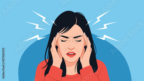 A stressed young woman suffering from a severe headache or migraine, pressing her temples in pain with her eyes closed tightly.