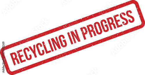 Vibrant red grunge stamp impression showing RECYCLING IN PROGRESS to denote an ongoing eco process