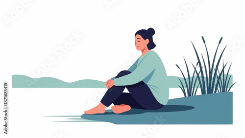 A woman sits peacefully by a serene lake, contemplating nature with tall reeds nearby.