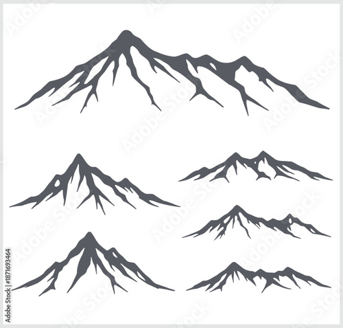 Set of mountain silhouettes in various sizes and angles